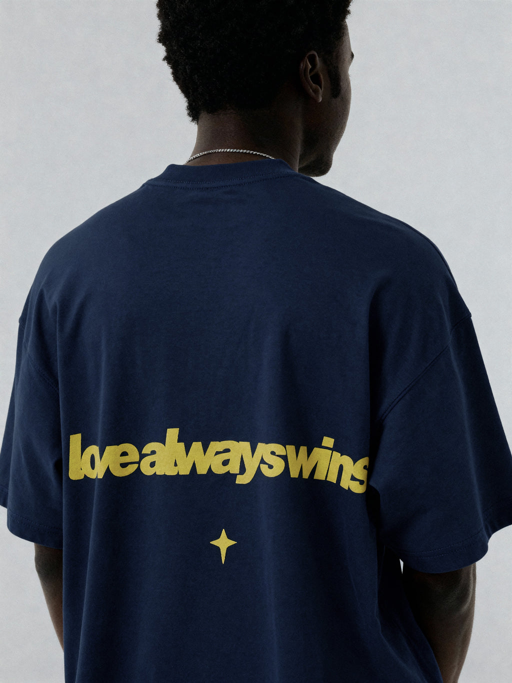 LOVE ALWAYS WINS NAVY TEE