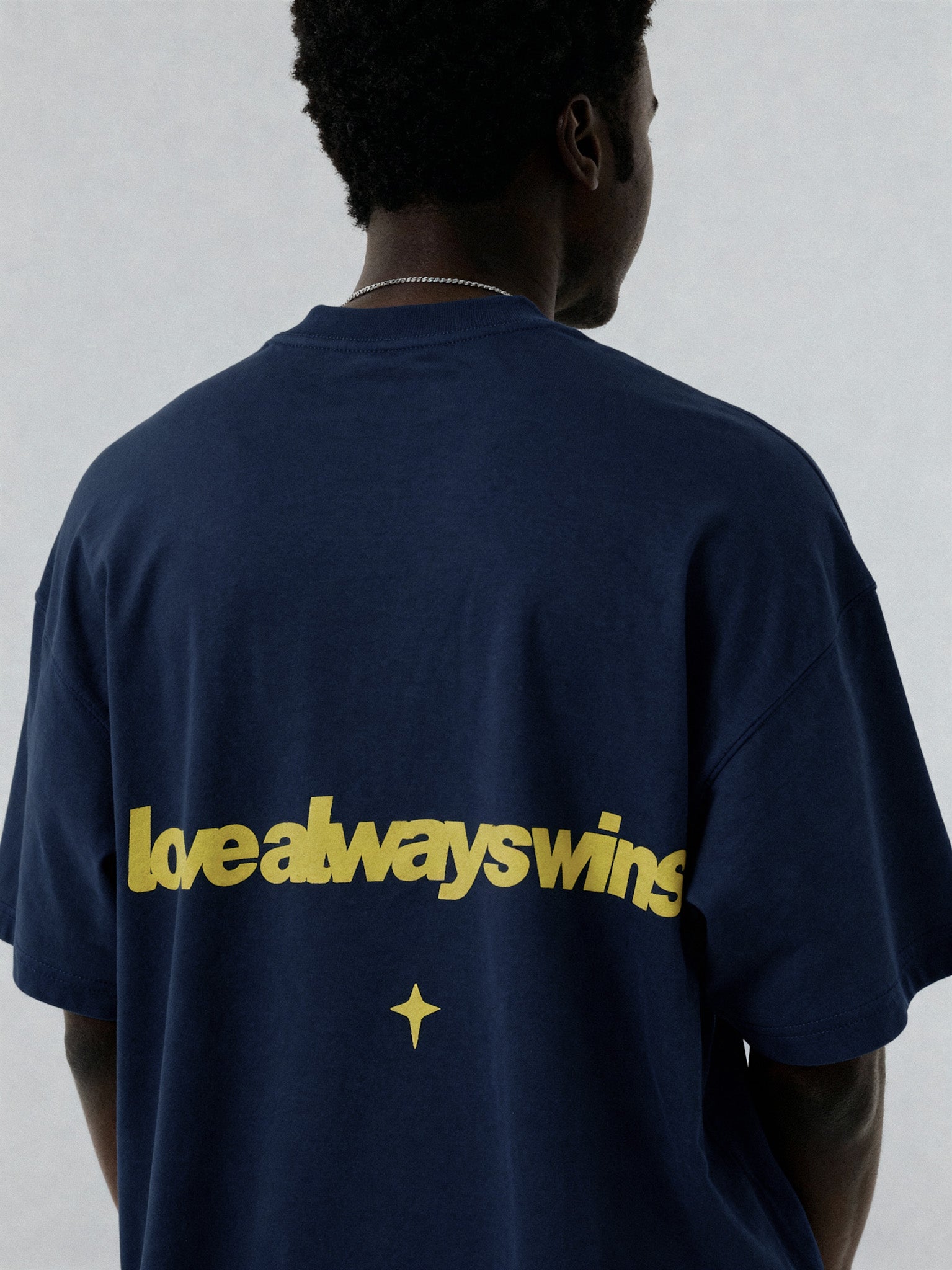 LOVE ALWAYS WINS NAVY TEE